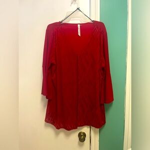 Beautiful red blouse.